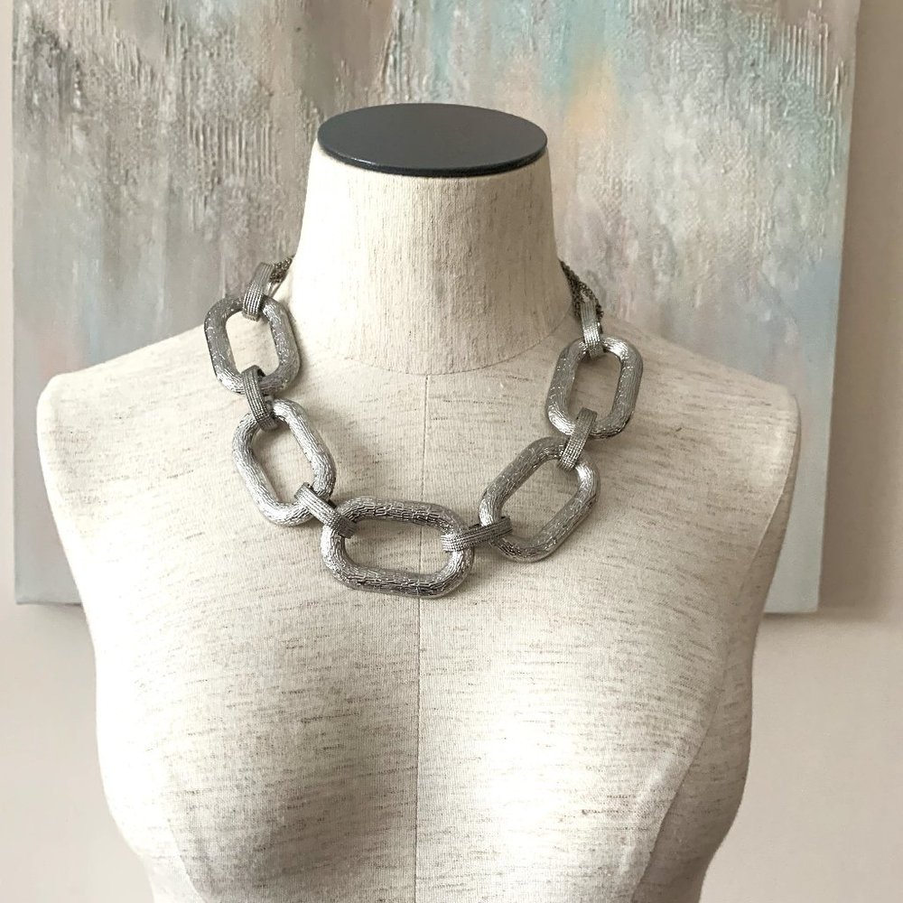 Silver colored large chain necklace